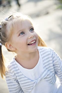 Girl in Pigtails - Pediatric Dentist in Temple Hills, MD, and Richmond, VA